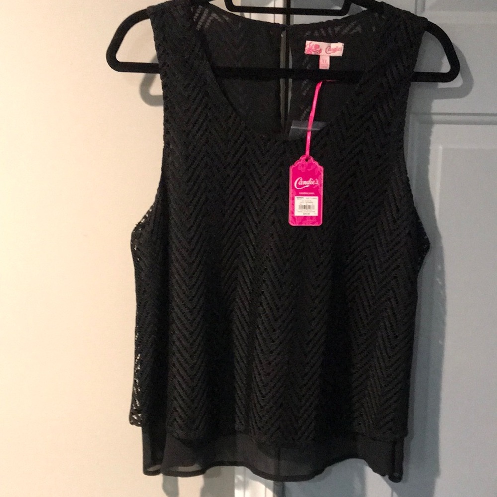 Black with black sheer underlining. Machine Washable